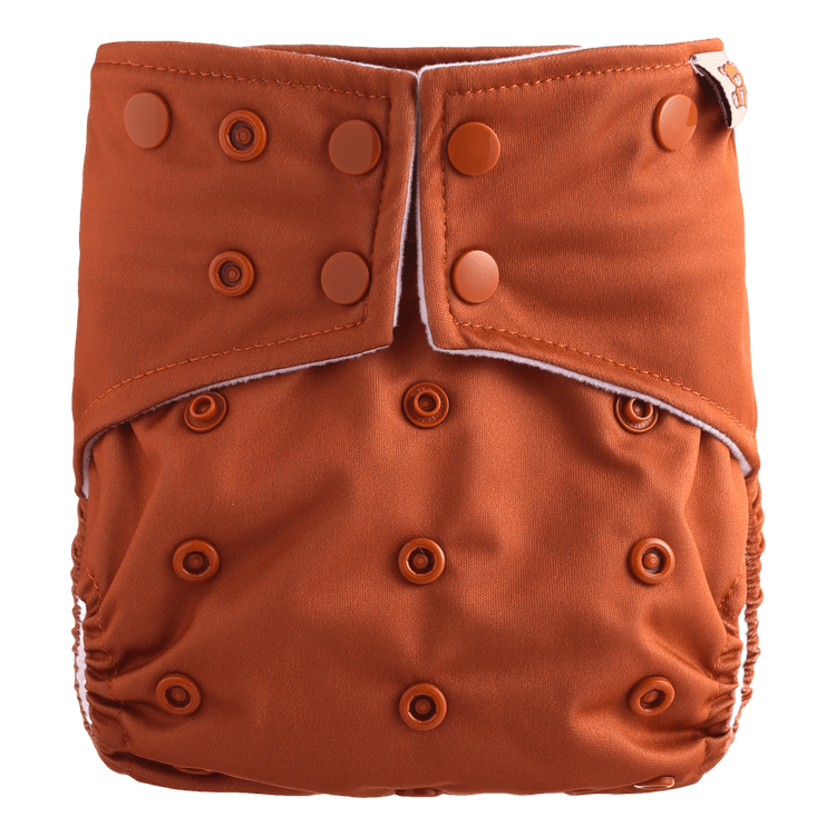 Herbruikbare wasbare luier in oranje met drukknopen uit het HappyBear Probeerpakket voor baby.